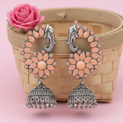 Tusks and twinkle stone studded jhumka earrings (Light Orange)