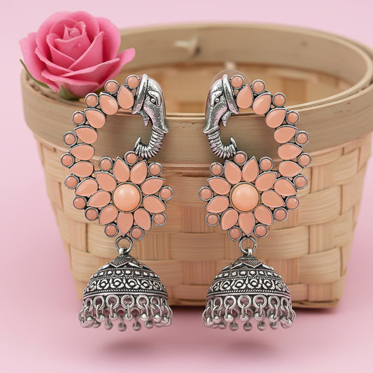 Tusks and twinkle stone studded jhumka earrings (Light Orange)