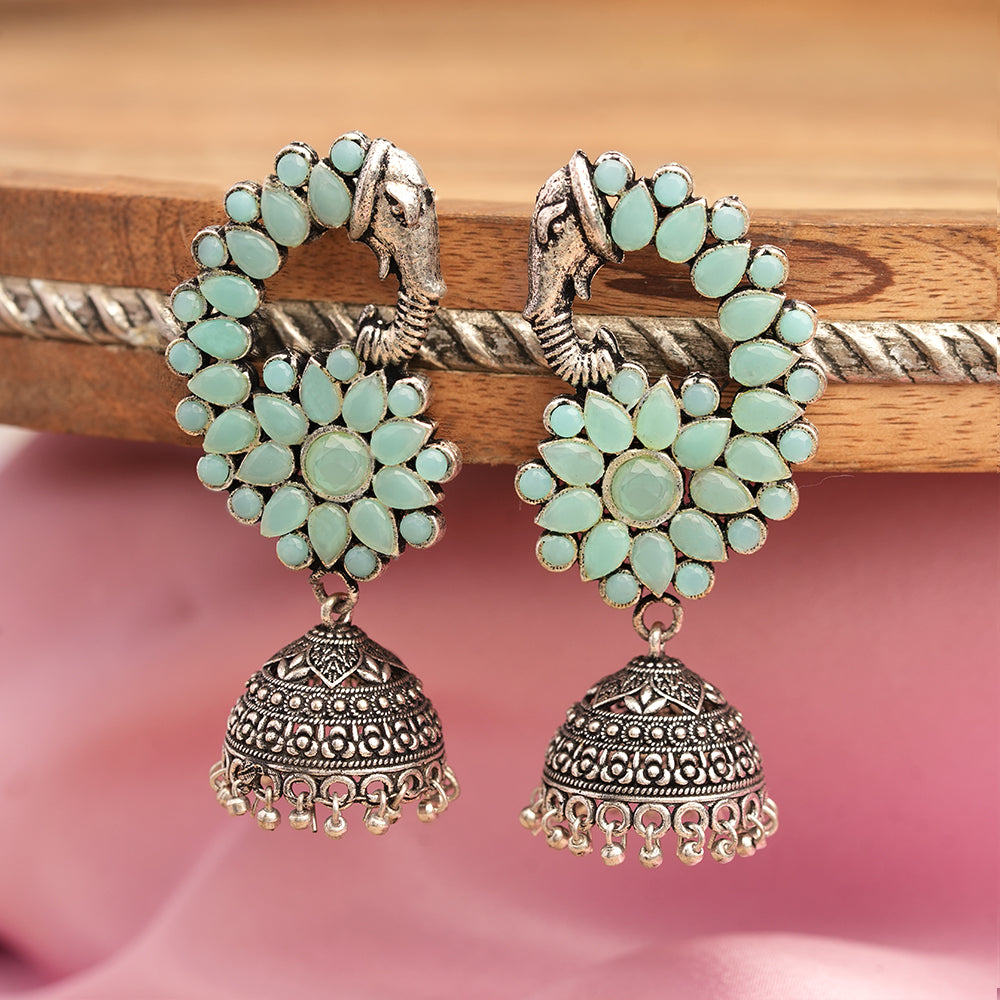 Tusks and twinkle stone studded jhumka earrings (Mint)