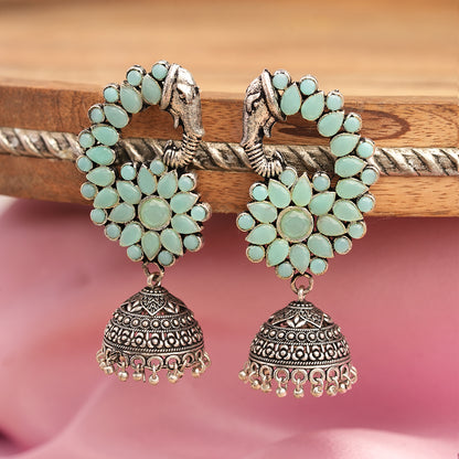 Tusks and twinkle stone studded jhumka earrings (Mint)