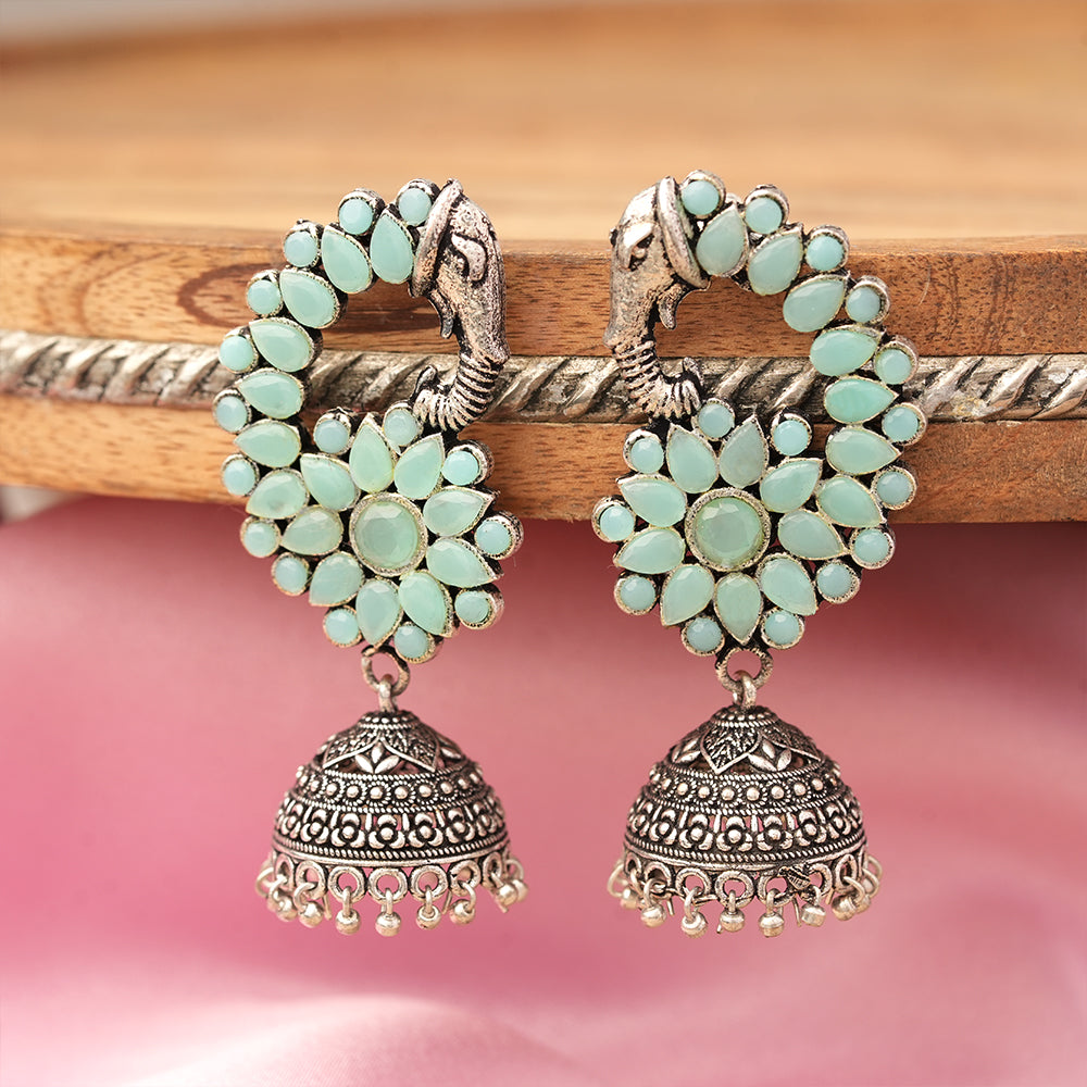 Tusks and twinkle stone studded jhumka earrings (Mint)