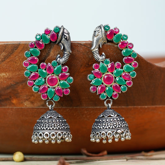 Tusks and twinkle stone studded jhumka earrings (Multicolored)