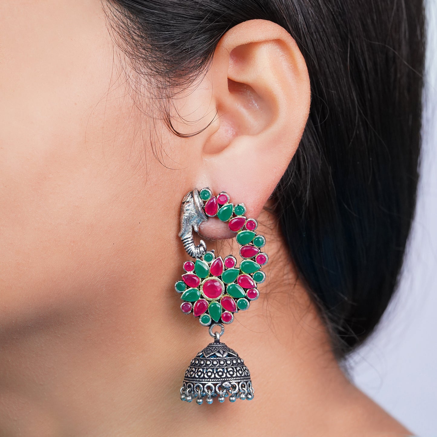 Tusks and twinkle stone studded jhumka earrings (Multicolored)