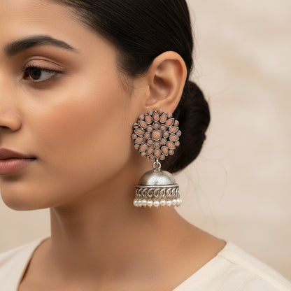 Floral carves stone studded jhumki earrings (Light Orange)
