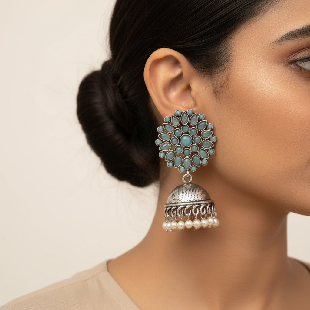 Floral carves stone studded jhumki earrings (Mint)