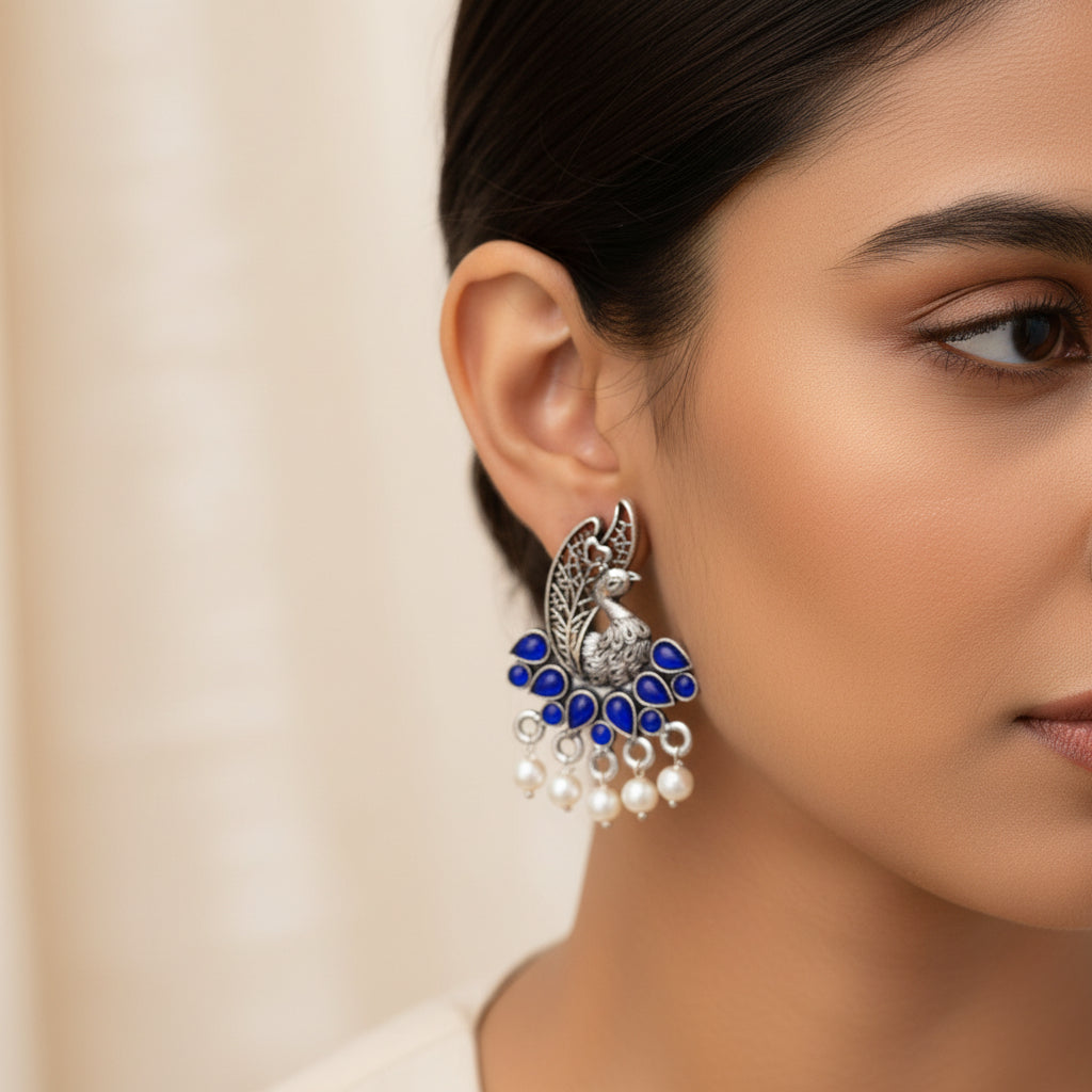 Peacock pearls studds earrings (Blue)
