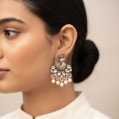 Peacock pearls studds earrings (White)