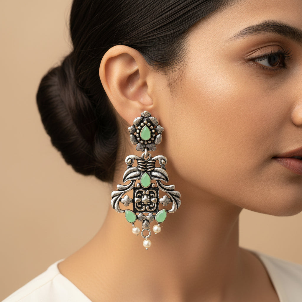 Feathered Grace dangler earrings (Pista)