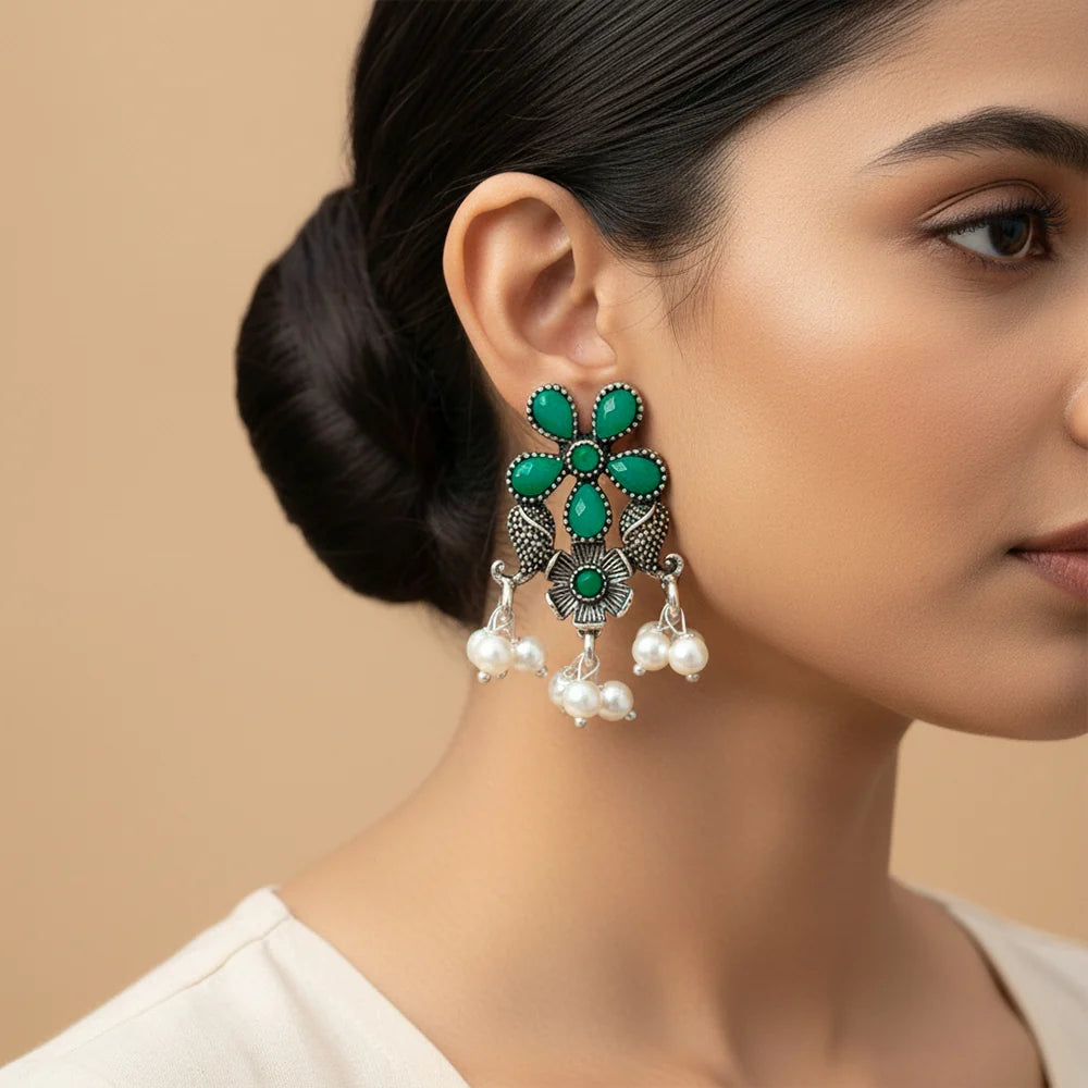 Peacock glow stone studded dangler & Floral Drop stud Combo set