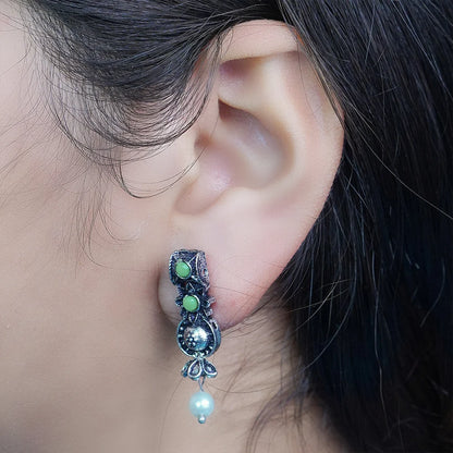 Peacock glow stone studded dangler & Wonderful wildflower oxidised stud set