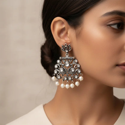 Peacock glow stone studded dangler earrings (White) Dazzle Dash Jhumki earring (White) Combo set