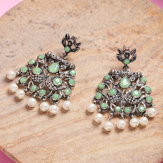 Peacock glow stone studded dangler earrings (Pista)