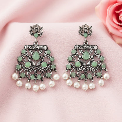 Peacock glow stone studded dangler earrings (Pista)