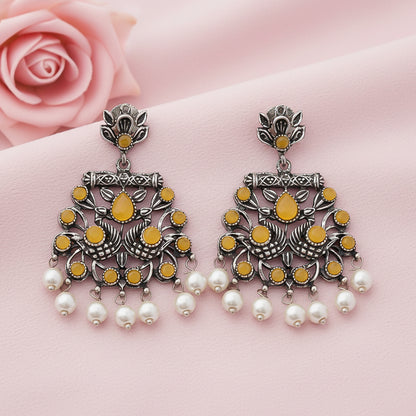 Peacock glow stone studded dangler earrings (Yellow)