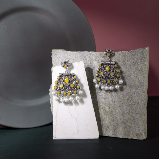 Peacock glow stone studded dangler earrings (Yellow)