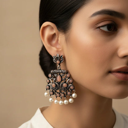 Dazzle Dash Jhumki earring (Baby Pink) Peacock glow stone studded dangler earrings (Light Orange) Combo set