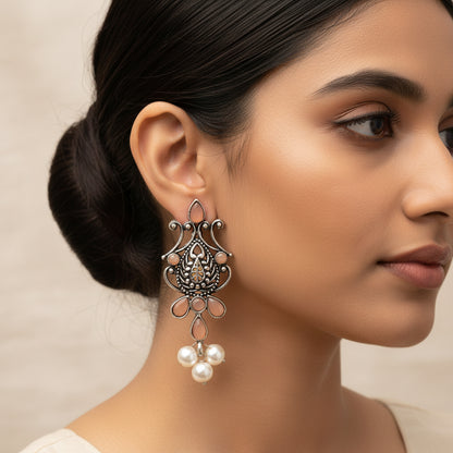 Flower motif hanging pearls dangler earring (Light Orange)