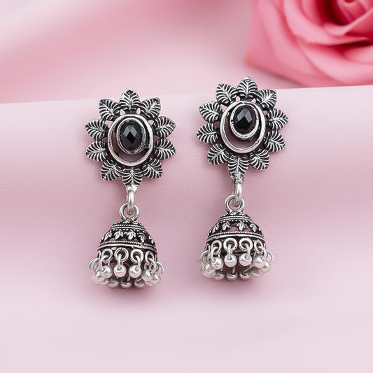 Stone studded floral jhumki earrings (Black)