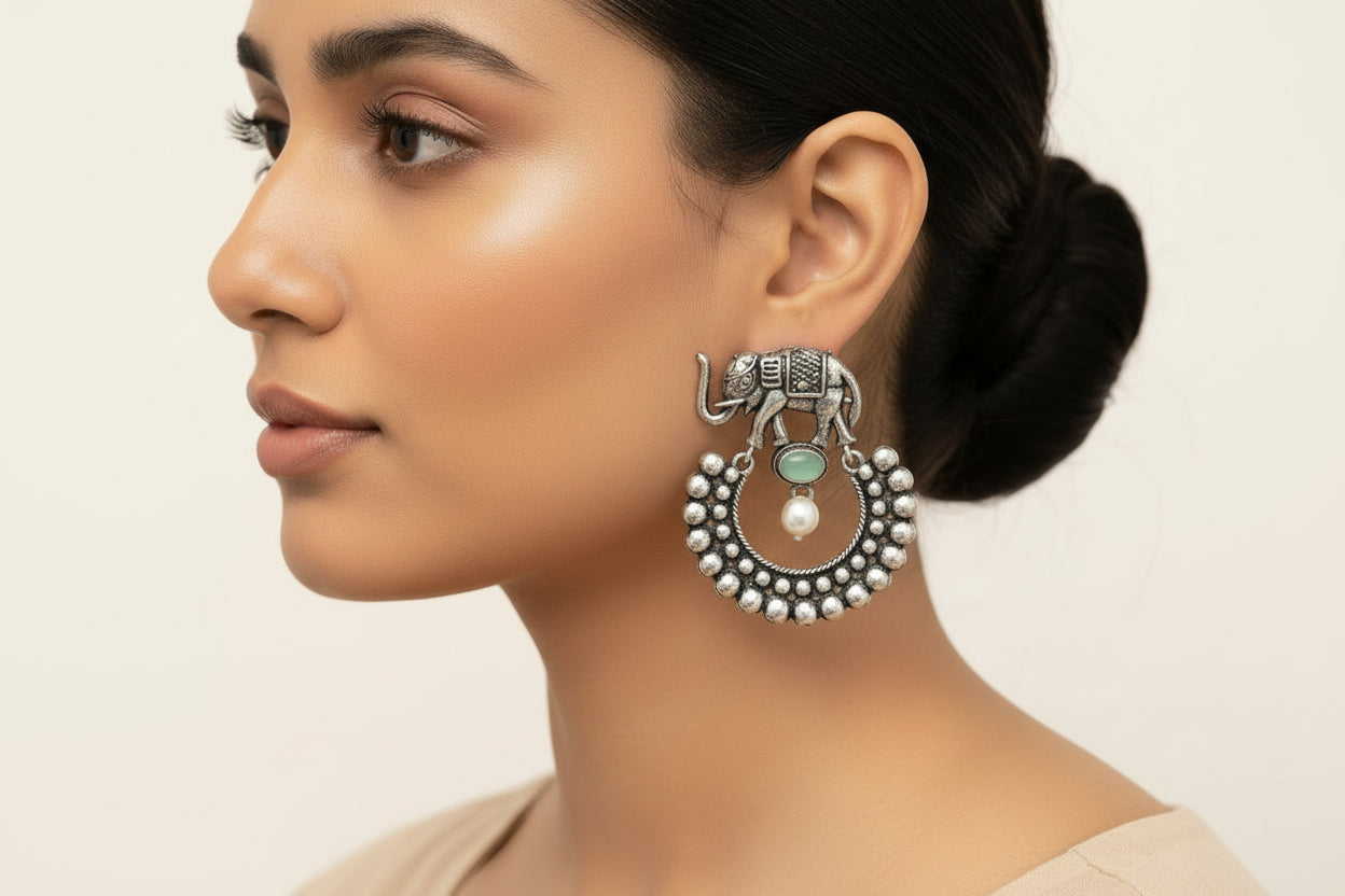 Elephant Arc dangler earrings (Pista)