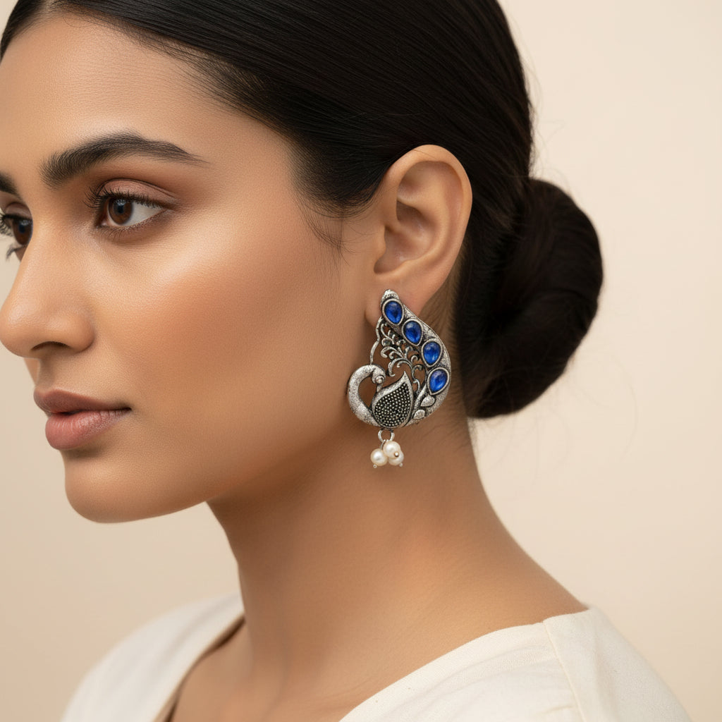 Ferocious Feathers stud earrings (Blue)