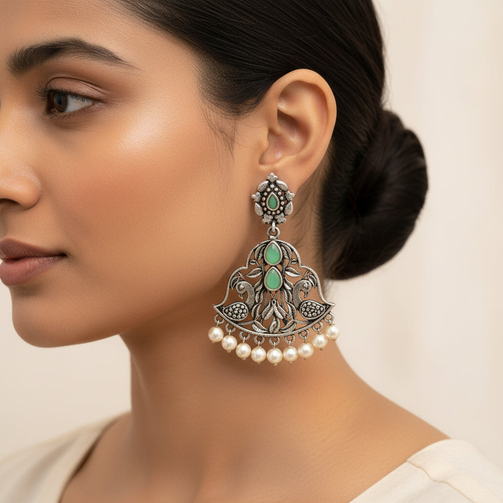 Morpatra dangler earrings (Pista)
