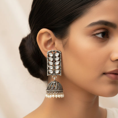 Regal leaffall stone studded jhumki earrings (White)