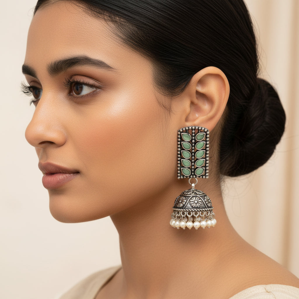 Regal leaffall stone studded jhumki earrings (Pista)