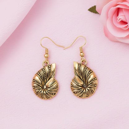 Conch Glow dangler earrings