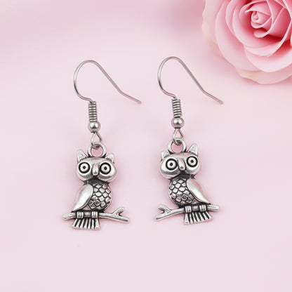 Wise Wink dangler earrings (Silver)