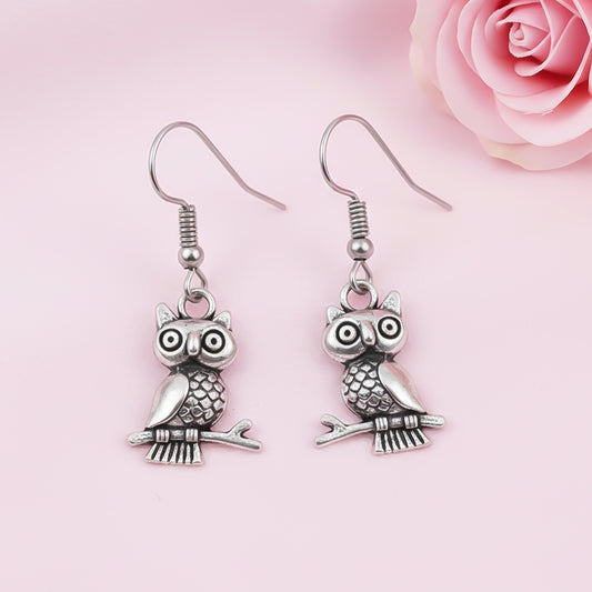 Wise Wink dangler earrings (Silver)