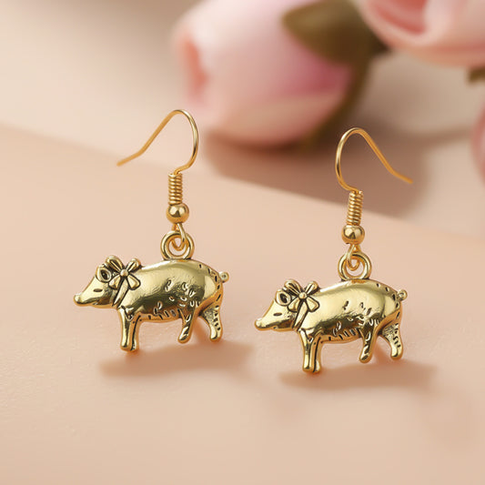 piggy dangler earrings