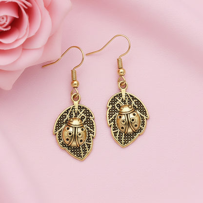 Beetle bling dangler earrings