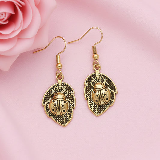Beetle bling dangler earrings