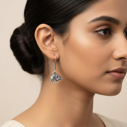 Carved Charm Dangler earrings &  Trunk Tales dangler earrings Combo set