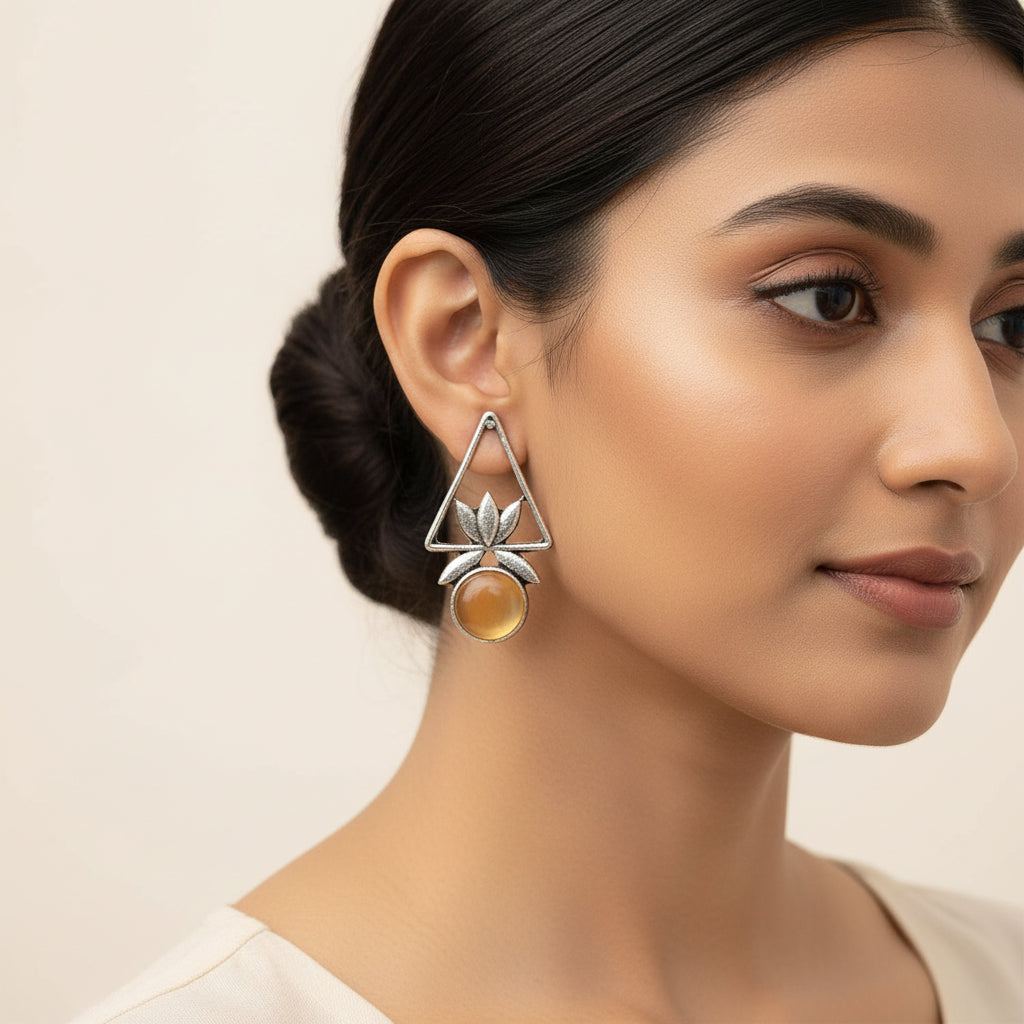 Lotriq oxidised stud earrings (Yellow)