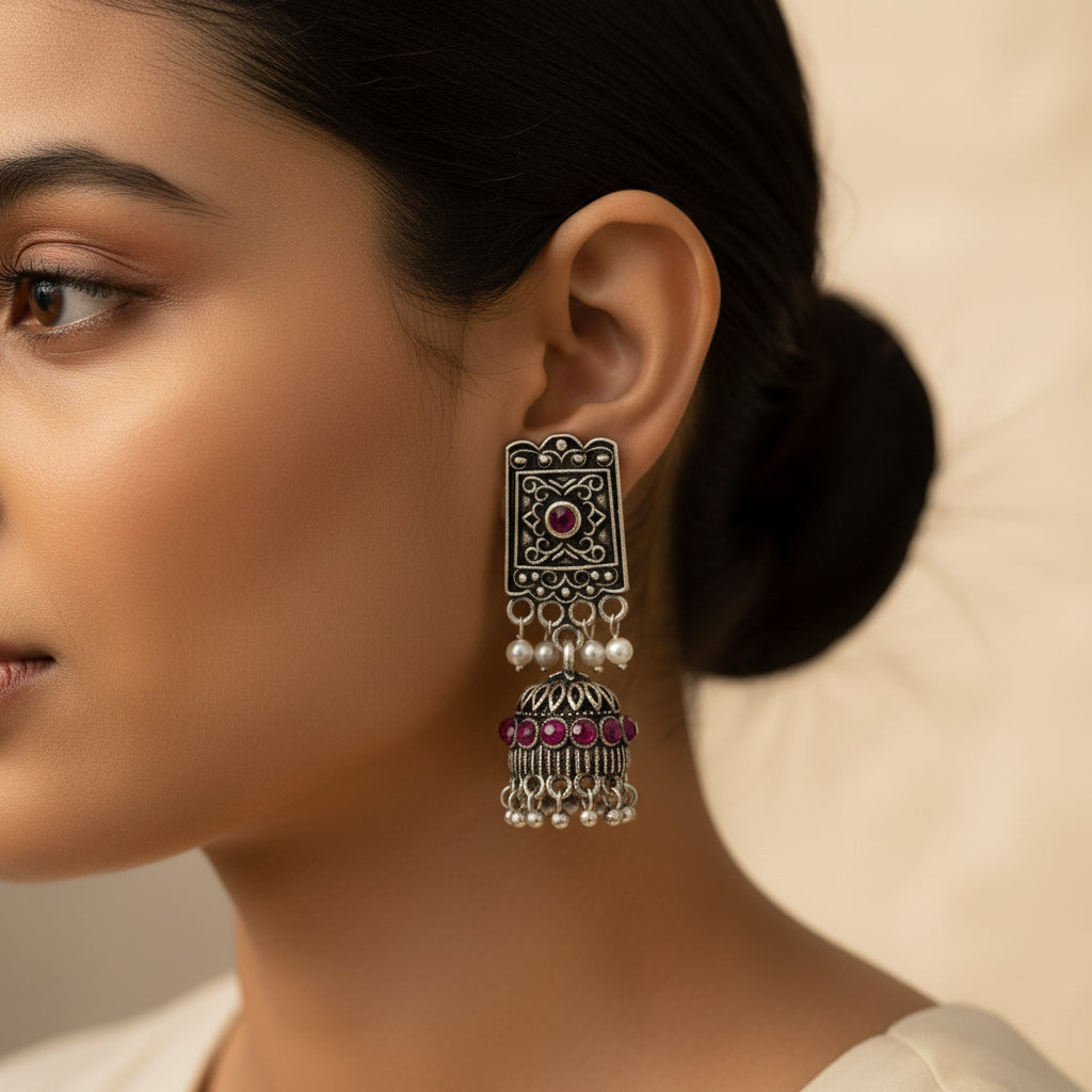 oxidized  jhumka earrings with pearl and Red stone detailin.