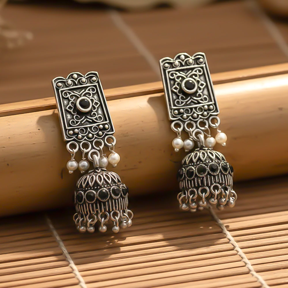 oxidized  jhumka earrings with pearl and Black stone detailing.
