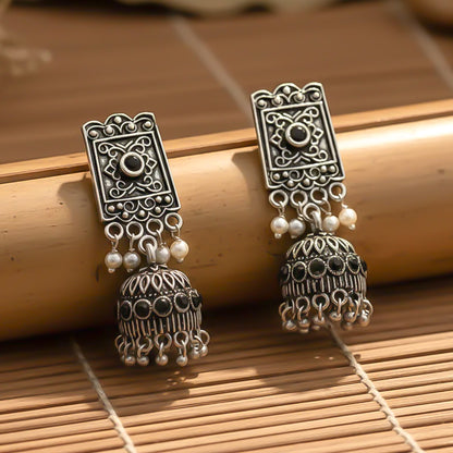 oxidized  jhumka earrings with pearl and Black stone detailing.