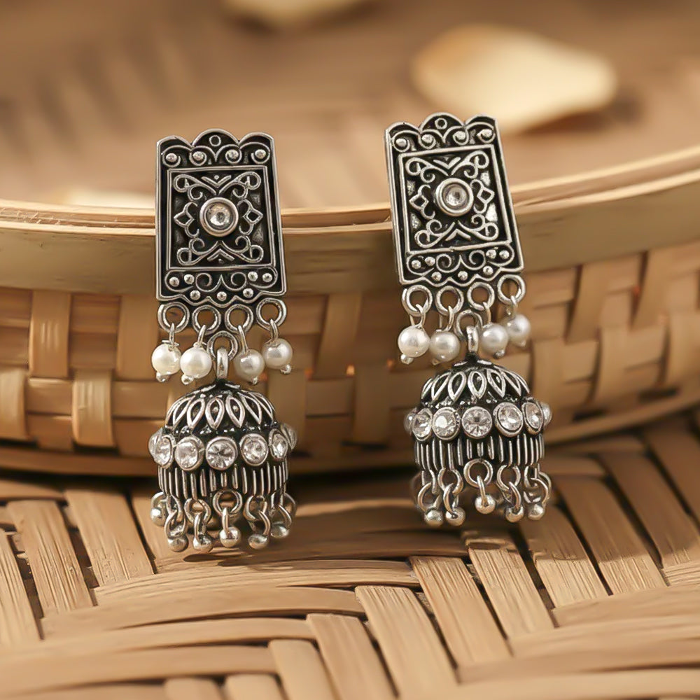 oxidized  jhumka earrings with pearl and white stone detailing.