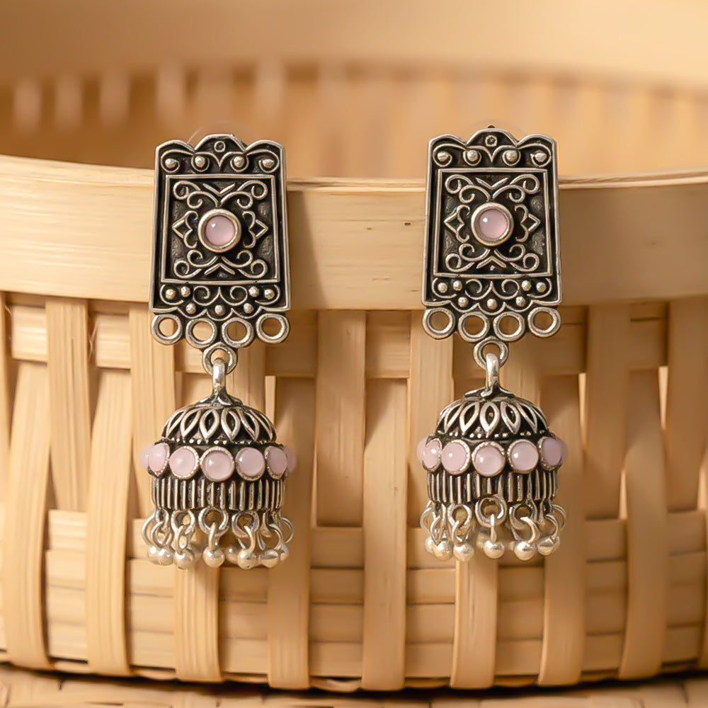 oxidized  jhumka earrings with pearl and baby pink stone detailin.