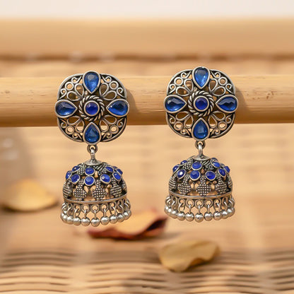 oxidized floral jhumka earrings with Blue stone detailing.