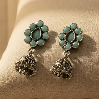 oxidized mint floral jhumka earrings with teardrop motif