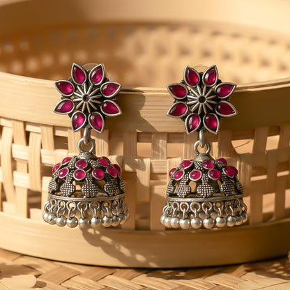 flower-shaped top with petal-like Red stones