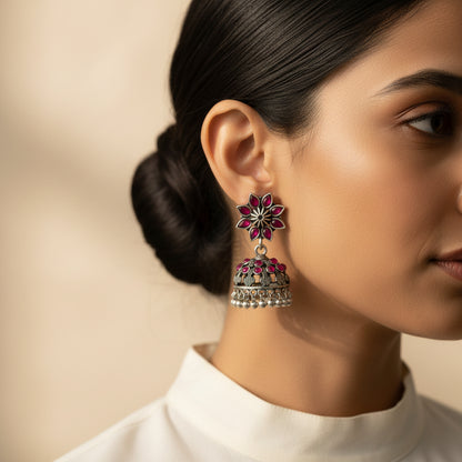 flower-shaped top with petal-like Red stones