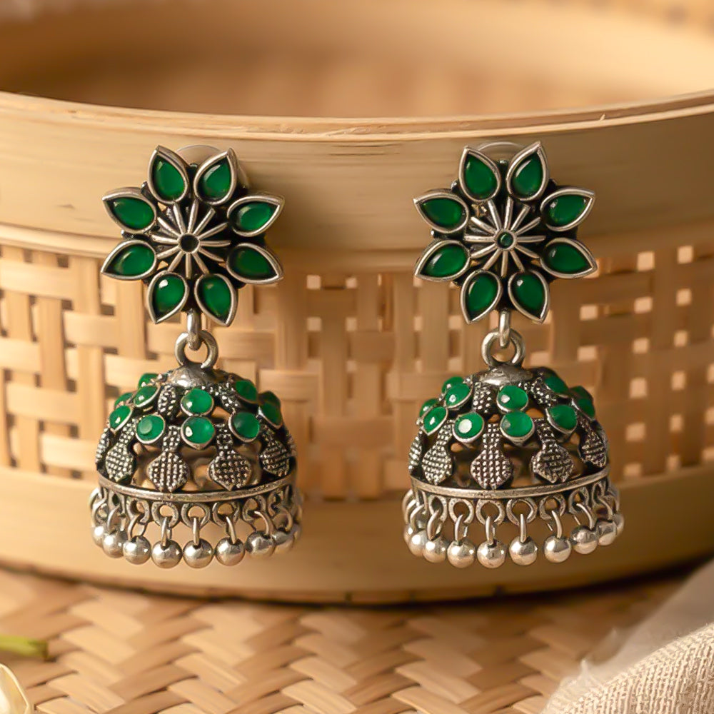 flower-shaped top with petal-like Green stones