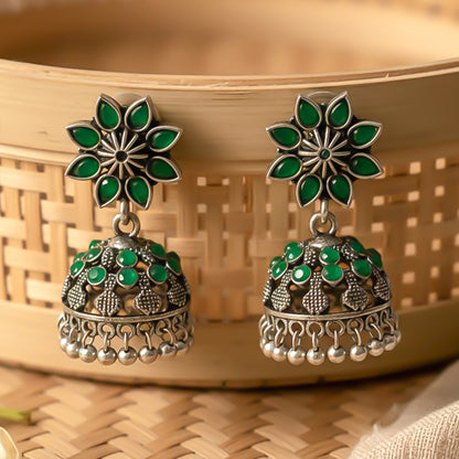 flower-shaped top with petal-like Green stones
