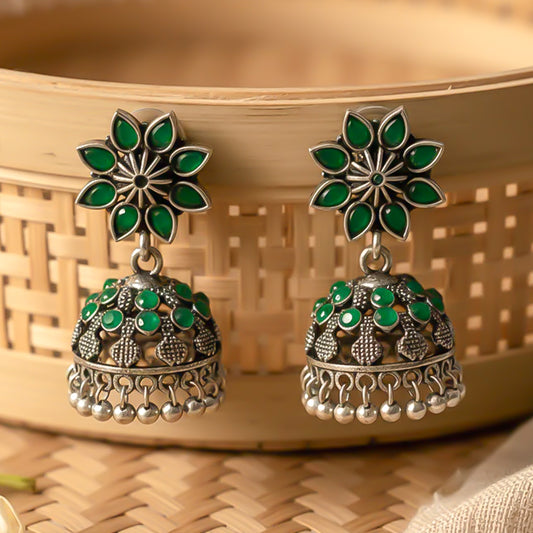 flower-shaped top with petal-like Green stones