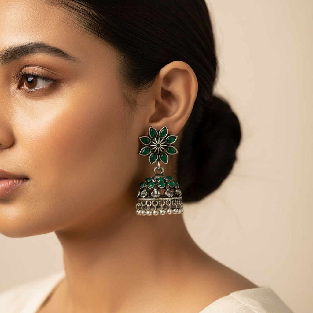 flower-shaped top with petal-like Green stones