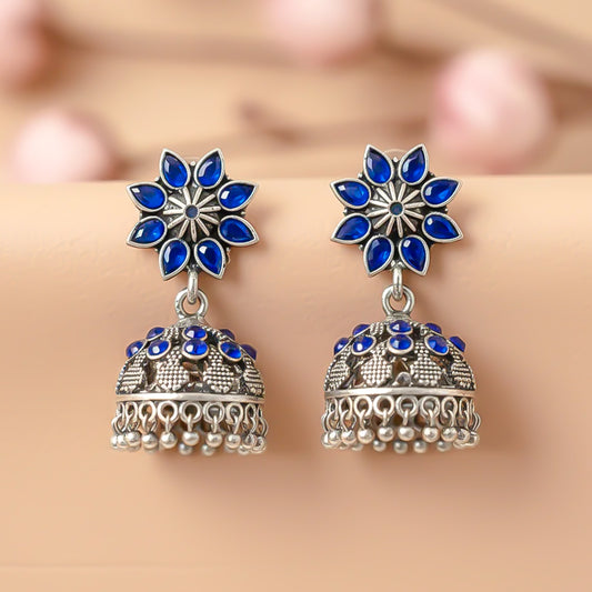 flower-shaped top with petal-like blue stones