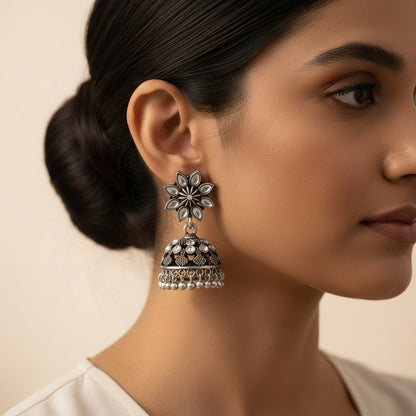 flower-shaped top with petal-like white stones
